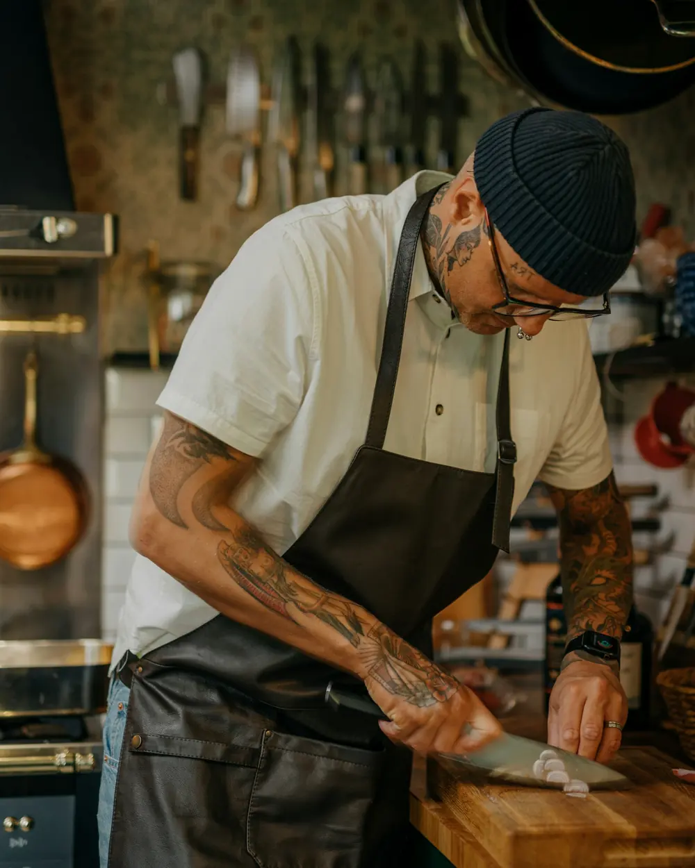 A chef preparing food in a kitchen