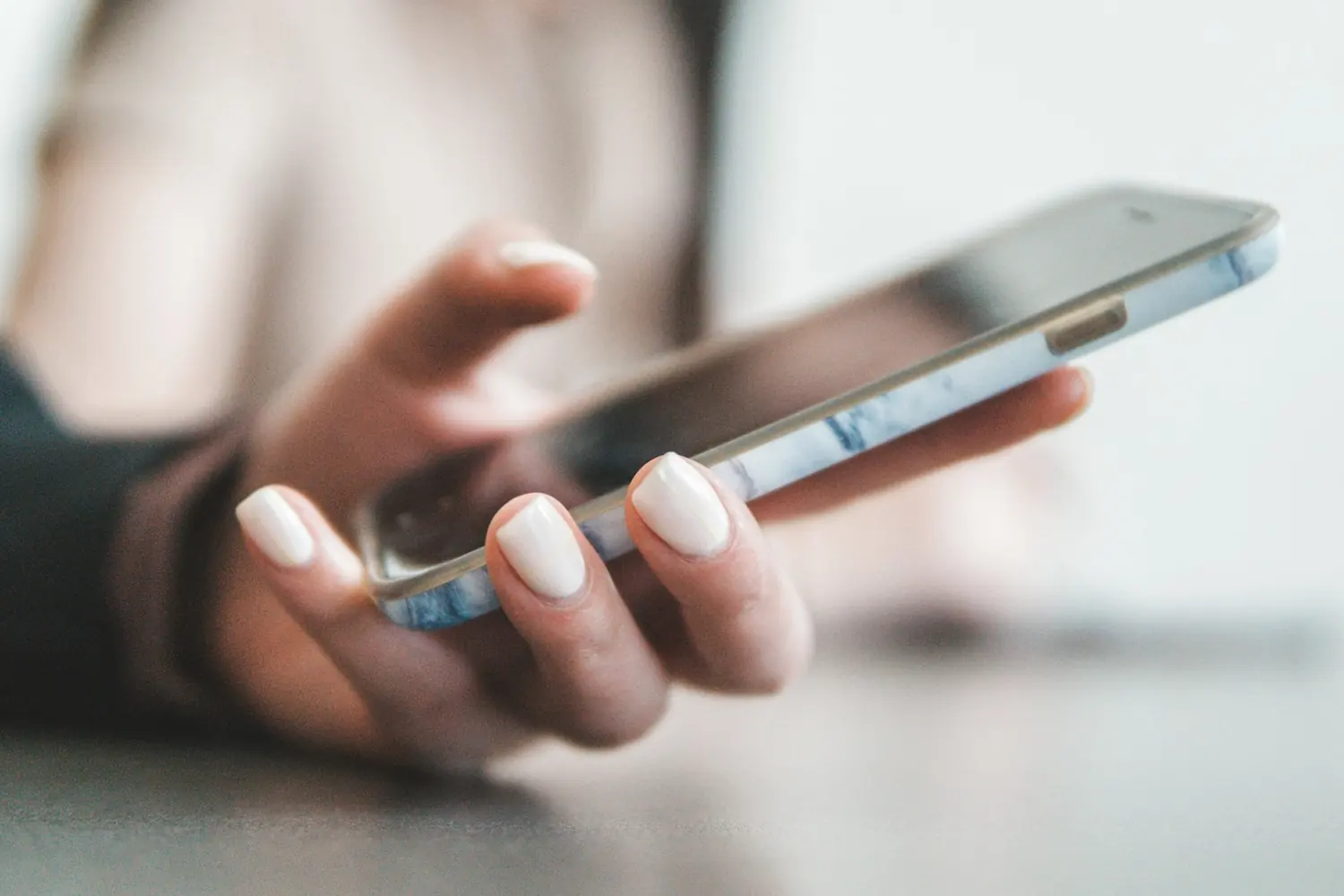 A phone held in one hand