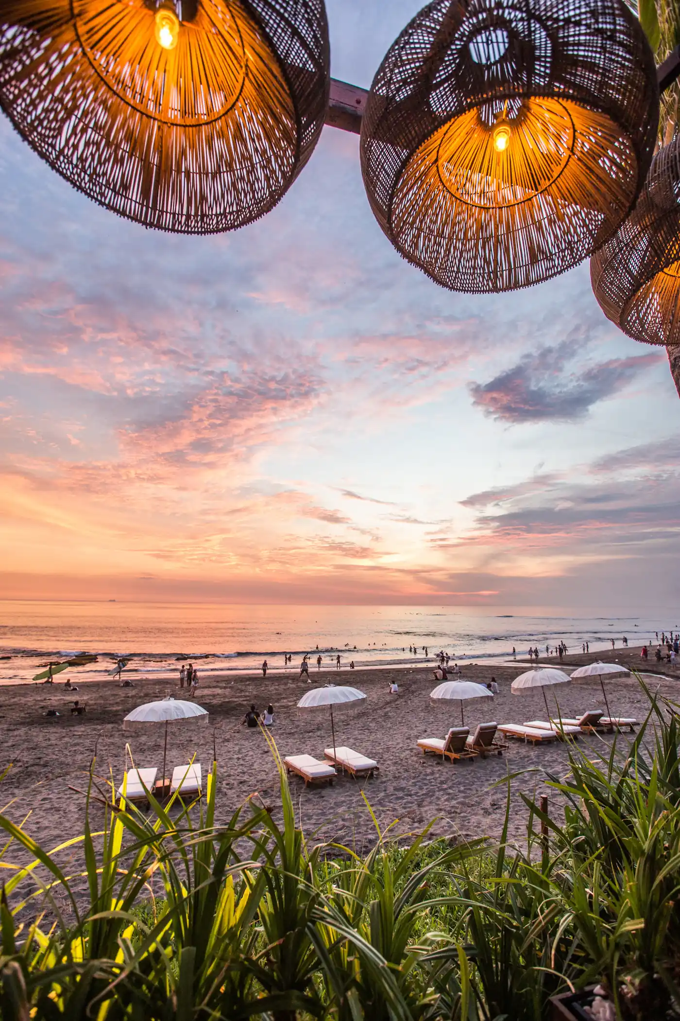 Umbrellas on the beach at sunset